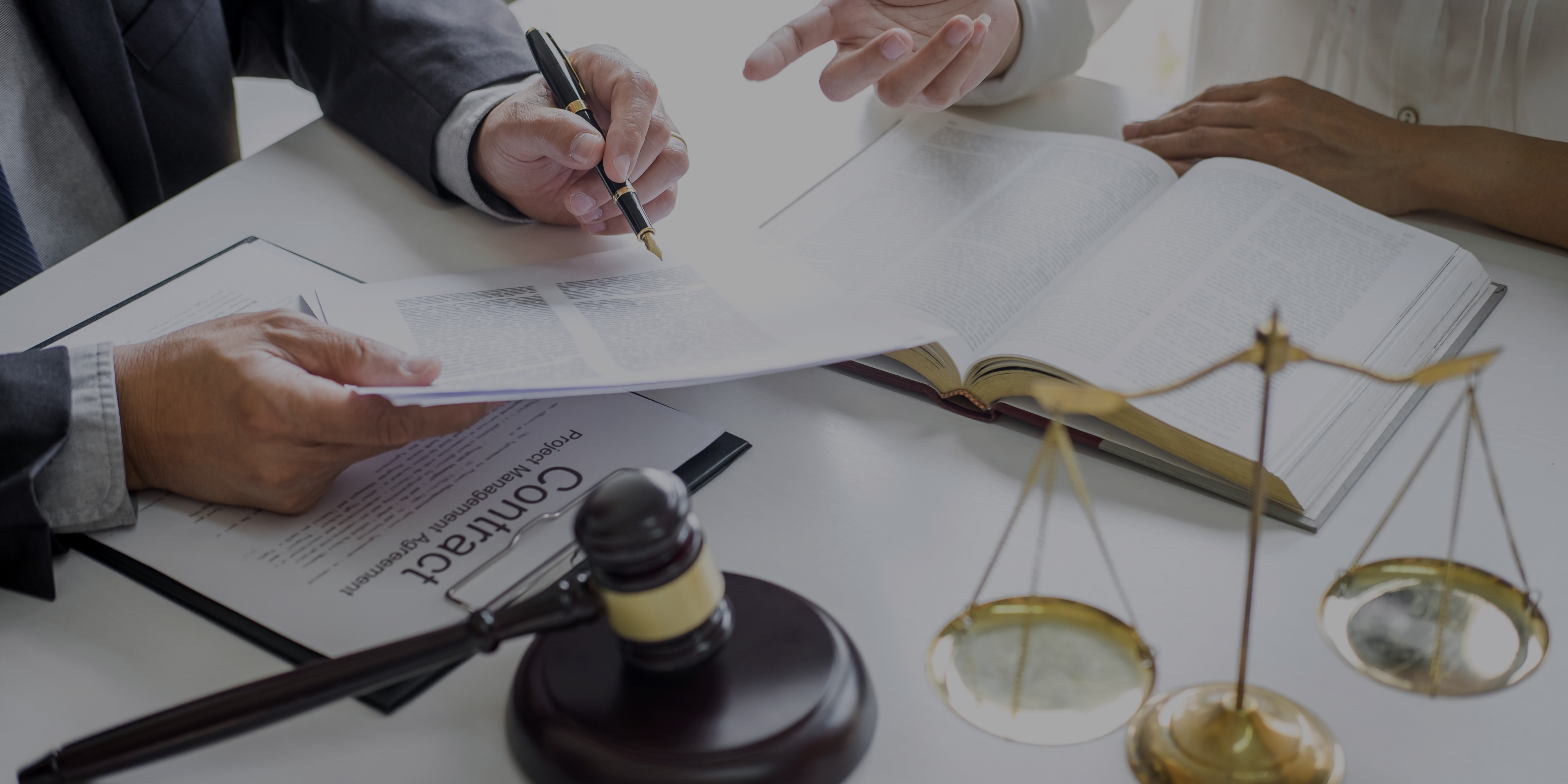 Untitled design (2) legal doccuments being discussed